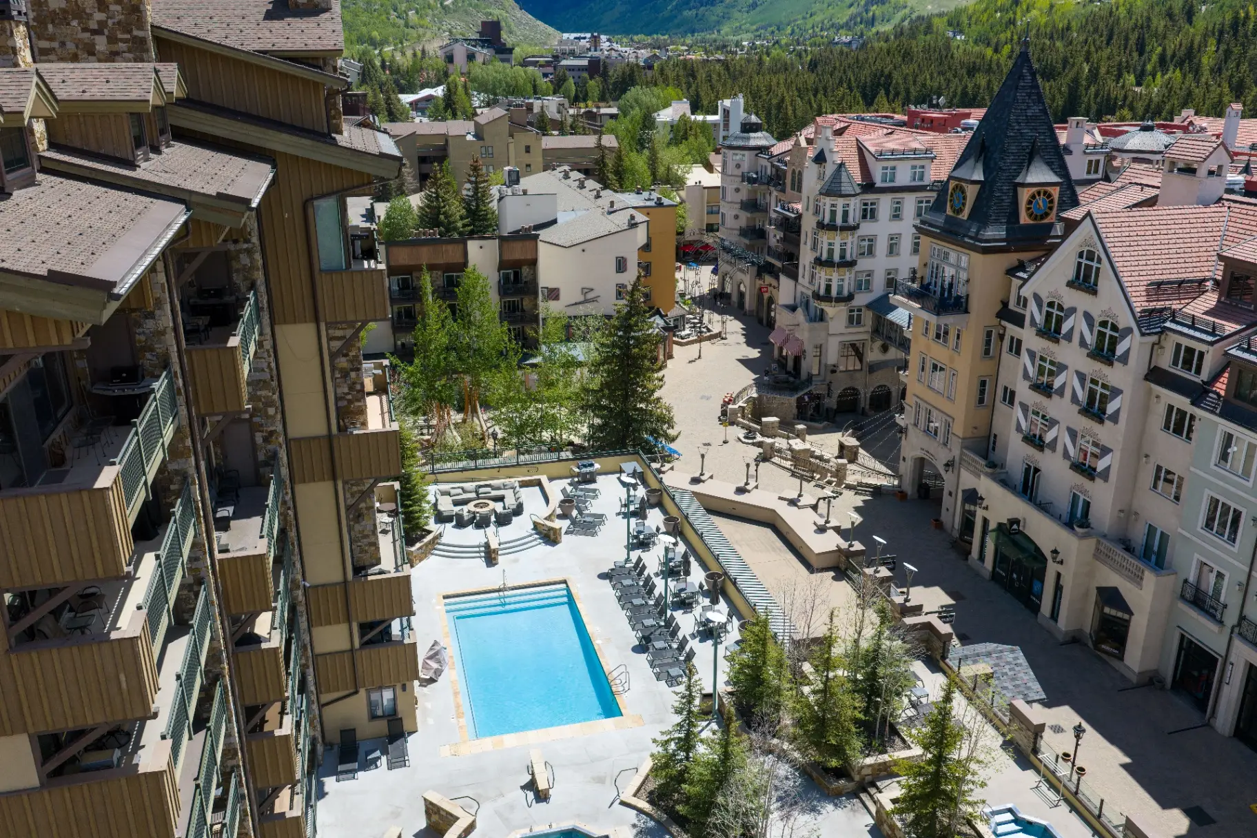Pool with Lionshead Village and clock tower