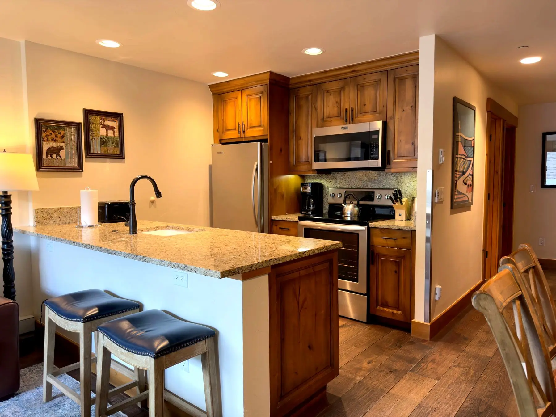 Kitchen with granite counters and stainless appliances