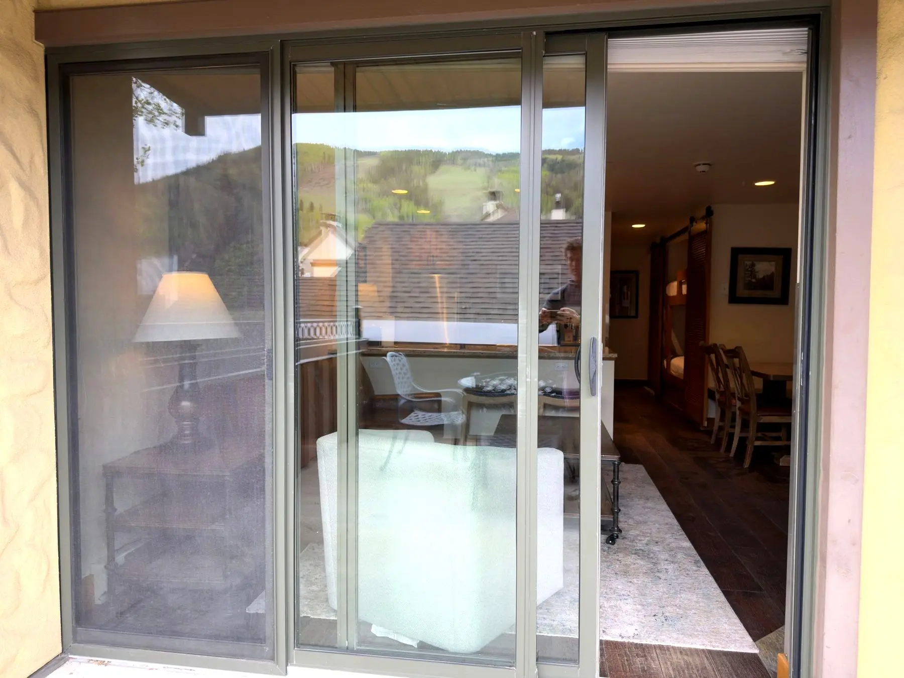 Sliding doors opening living space to the terrace